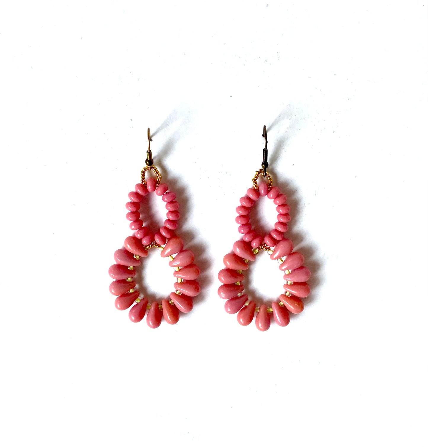 PENDIENTES ROSA ENTRE PALMERAS